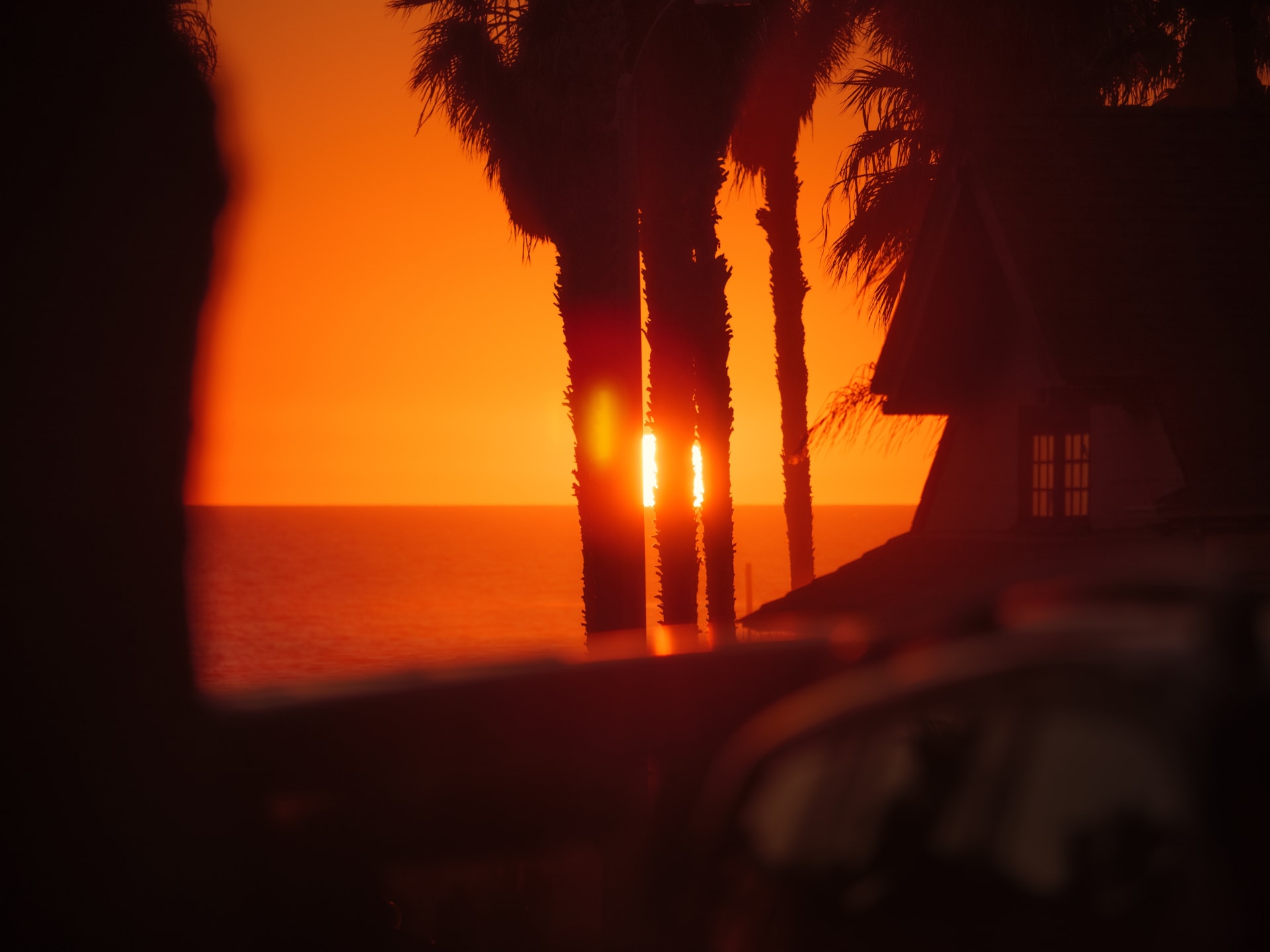 sunset-sun-dipping-into-pacific-ocean