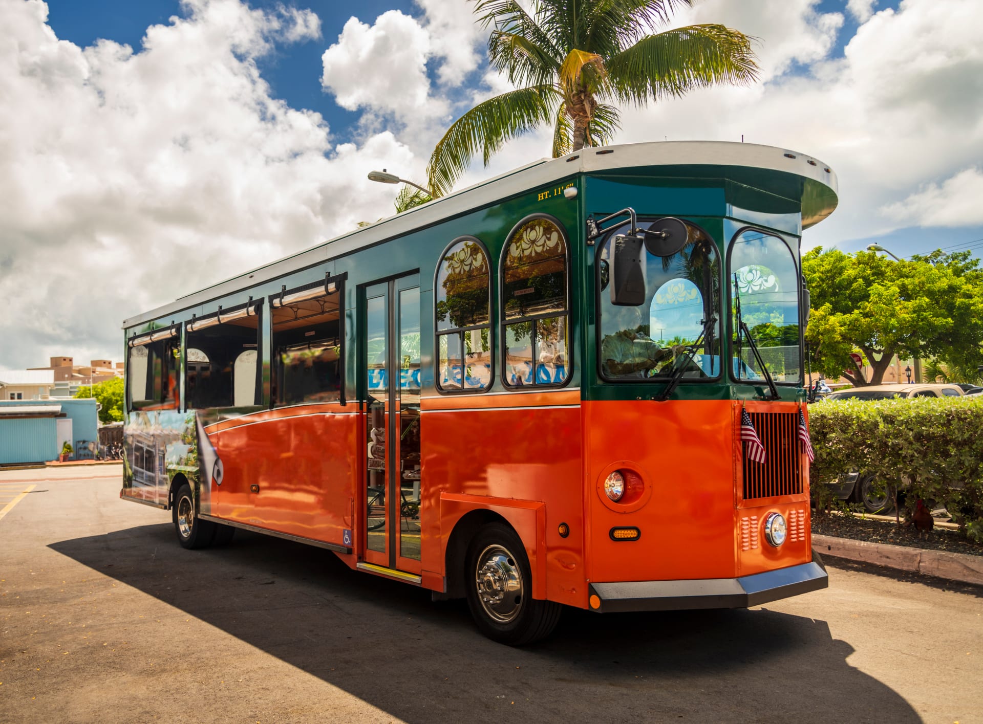 tourists-travel-on-historic-orange-trolley