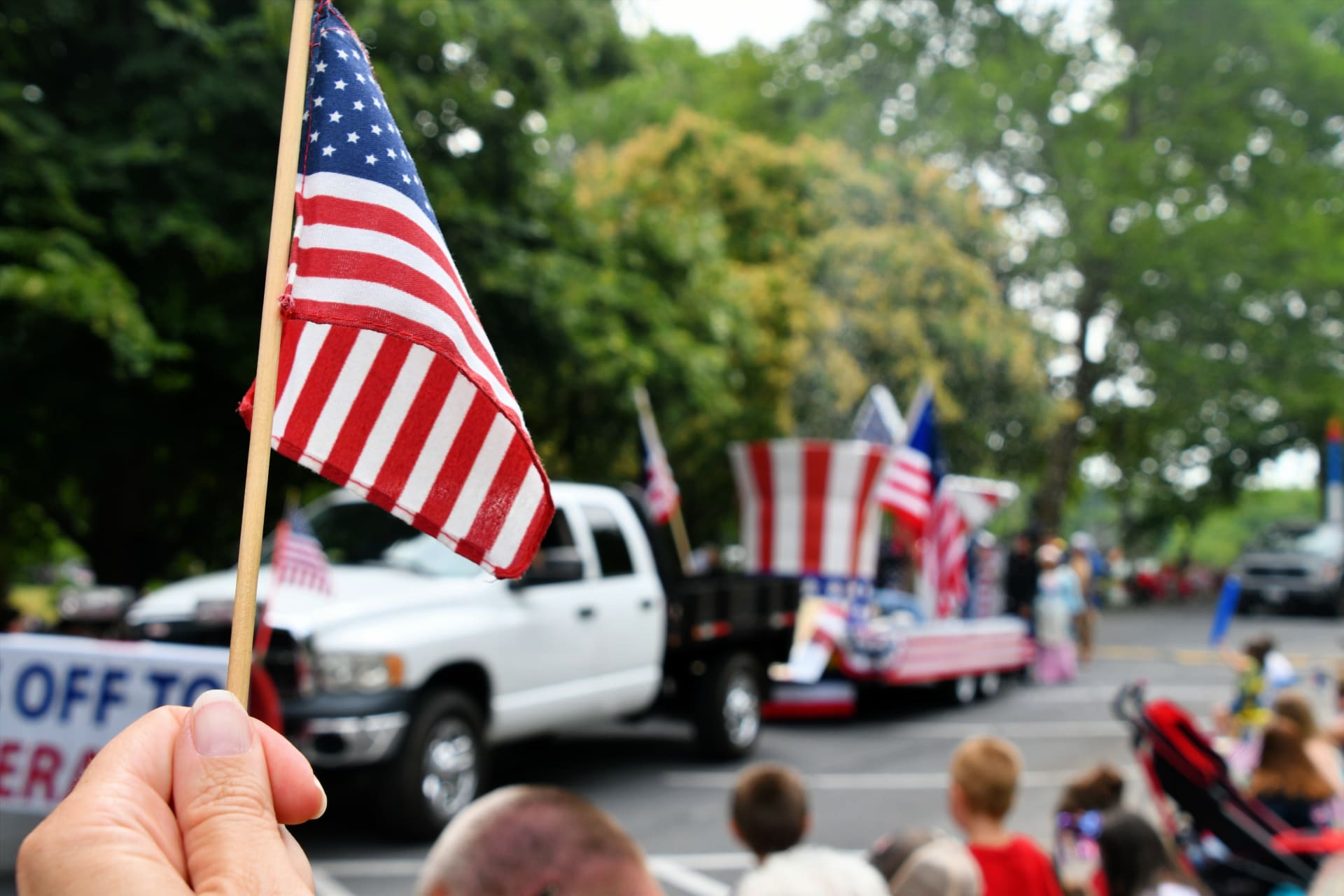 waving-american-flag-day-parade