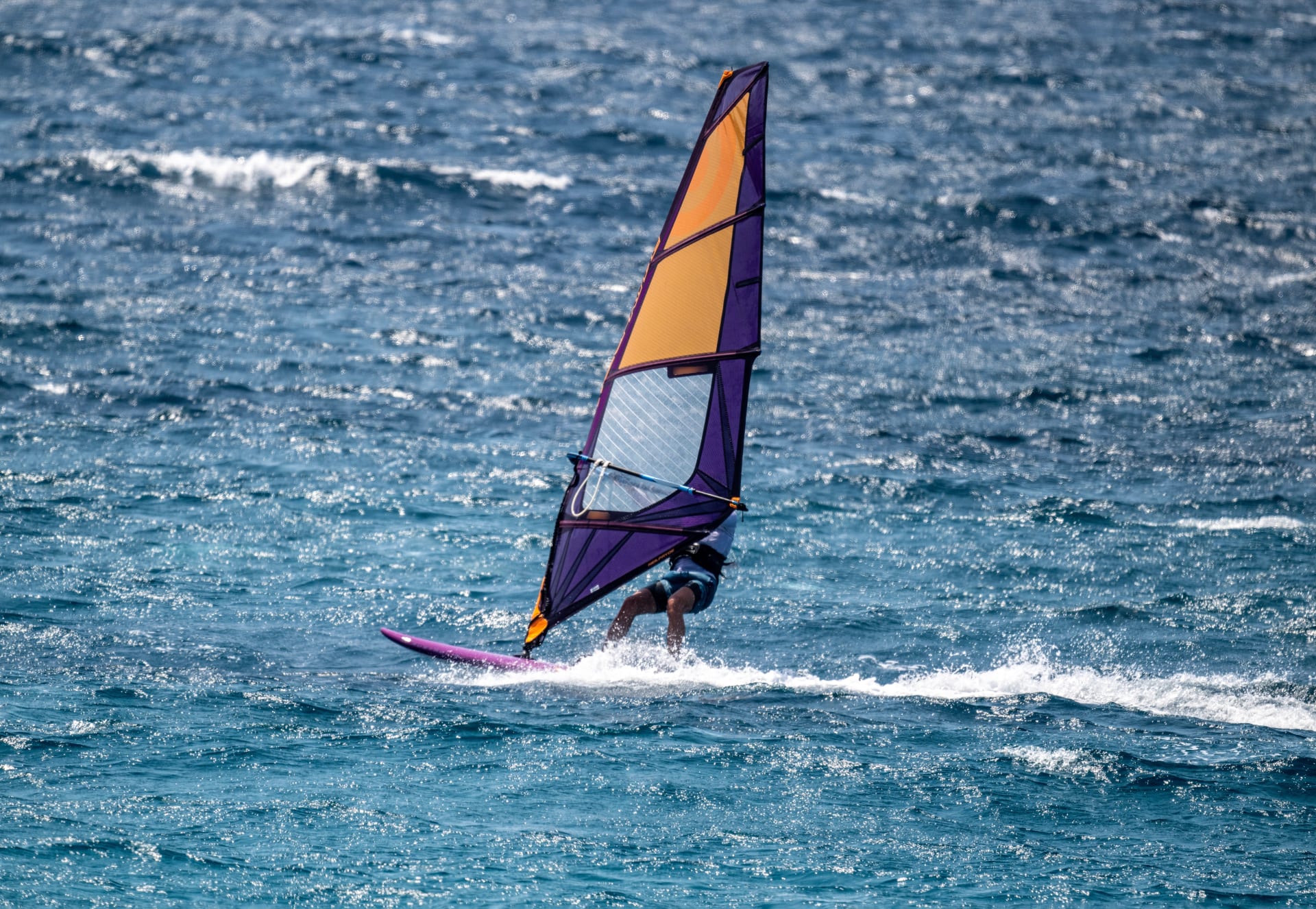 windsurfing-like-colorful-butterflies-against-blue