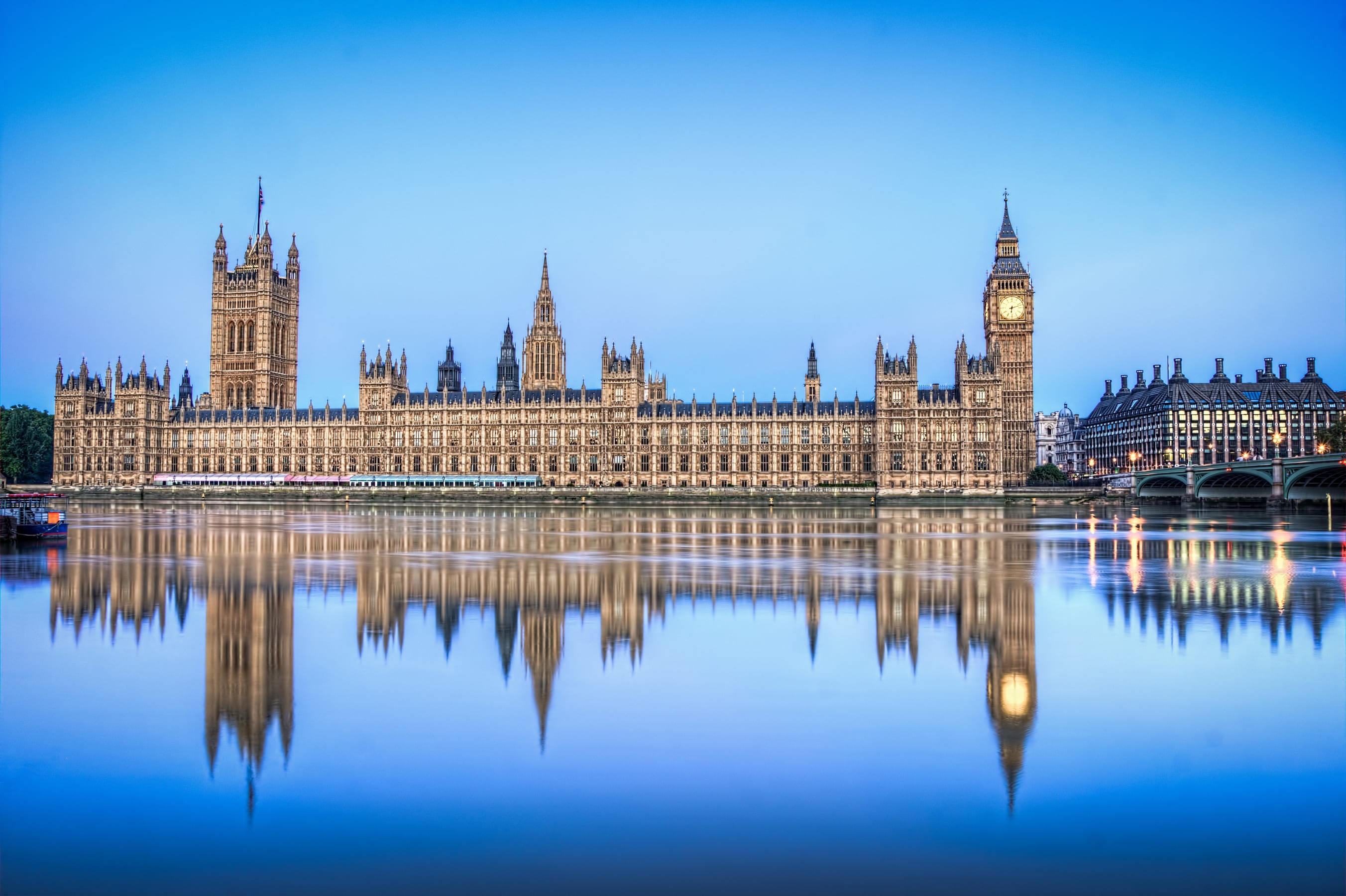 Houses of Parliament reflected in the River Thames, London