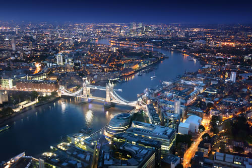 London skyline at night over River Thames