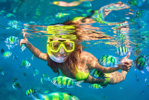 Girl snorkeling in Cancun