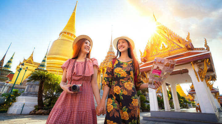 Tourists in the grounds of the Grand Palace, Bangkok