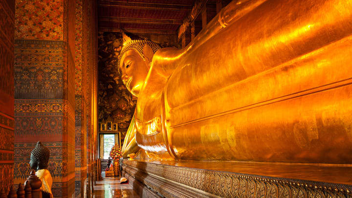 Huge reclining Buddha at Wat Pho in Bangkok