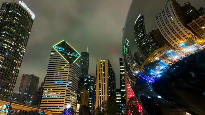 Cloud Gate aka 'The Bean' reflecting the Chicago skyline at night