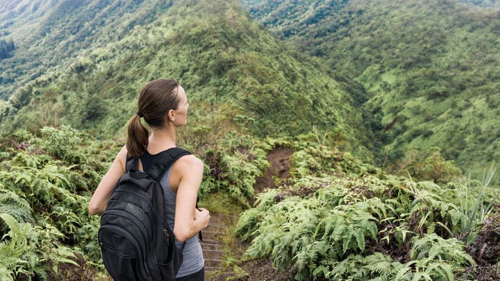 Hiker exploring the hills of Oahu island in Hawaii