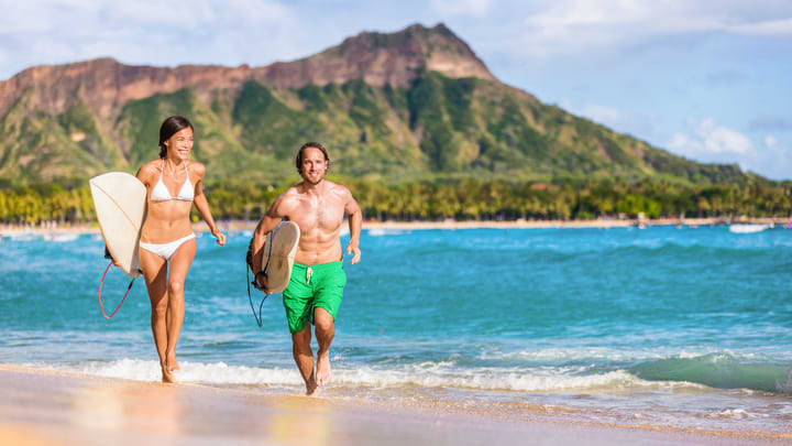 Surfers on Waikiki Beach, Oahu