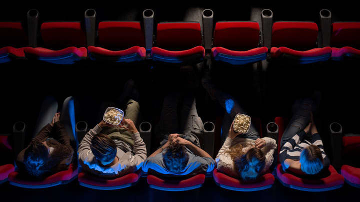 Aerial view of cinema goers with popcorn