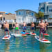 Paddle boarders in Huntington Harbor, Orange County.