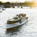 A boat cruising on the Seine river in Paris.