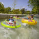 Family on a lazy river at Shlitterbahn Waterpark in New Braunfels, Texas.