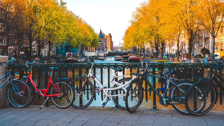 Image of Bicycle, Vehicle, City, Boat, Nature, Outdoors, Scenery, Person, 