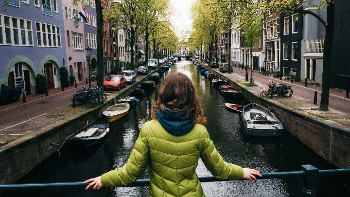 Image of Canal, Outdoors, Water, City, Boat, Vehicle, Urban, Road, Street, Adult, Female, Person, Woman, Car, Path, 