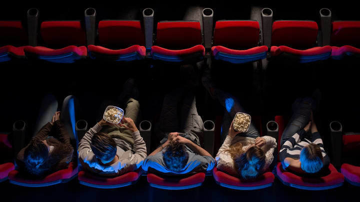 Image of Shoe, Adult, Female, Person, Woman, Male, Man, Sneaker, Indoors, Theater, Chair, Furniture,