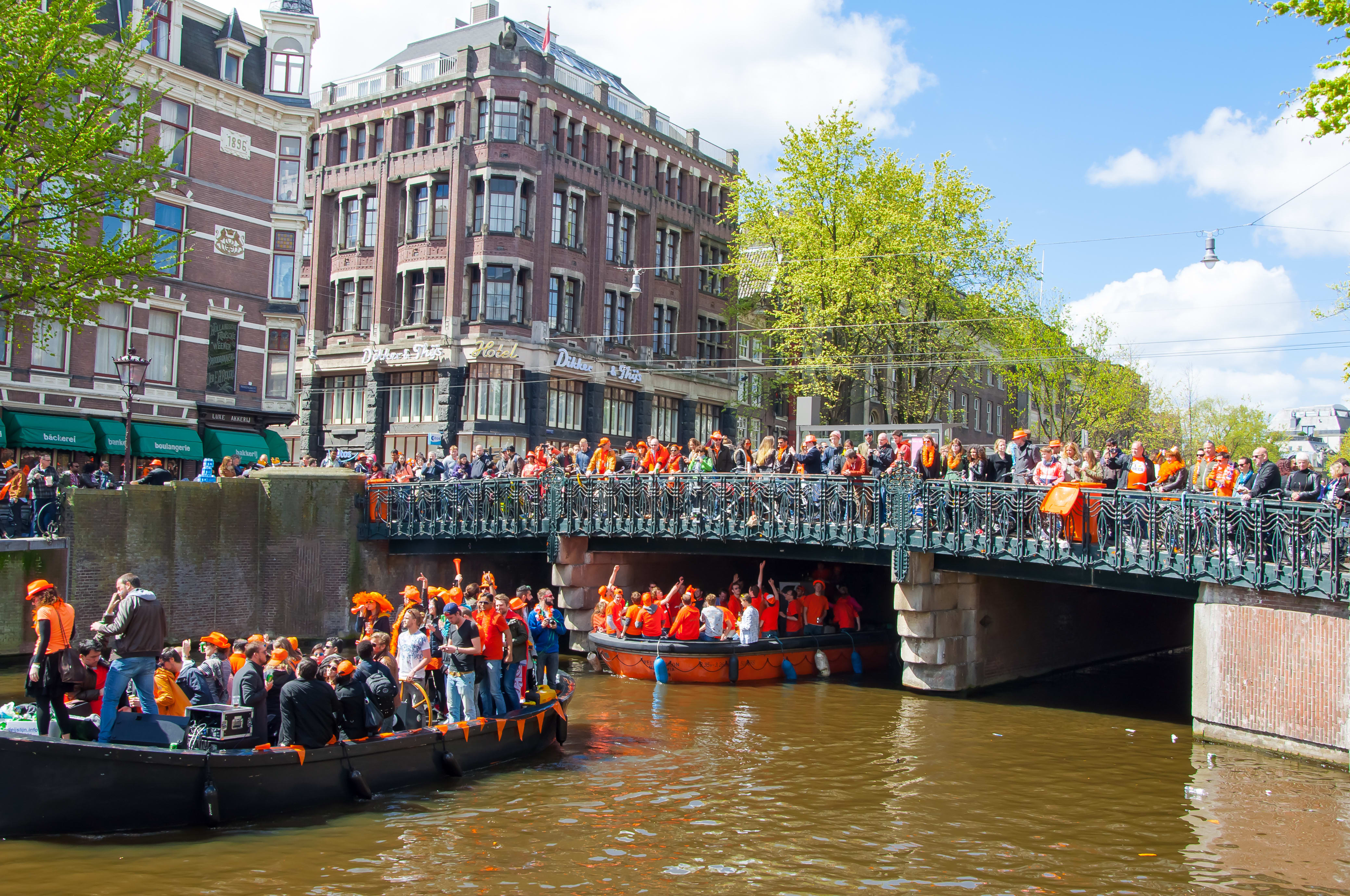 Image of Canal, Outdoors, Water, Waterfront, Boat, Vehicle, Person, People, City, Watercraft, Boating, Water Sports,