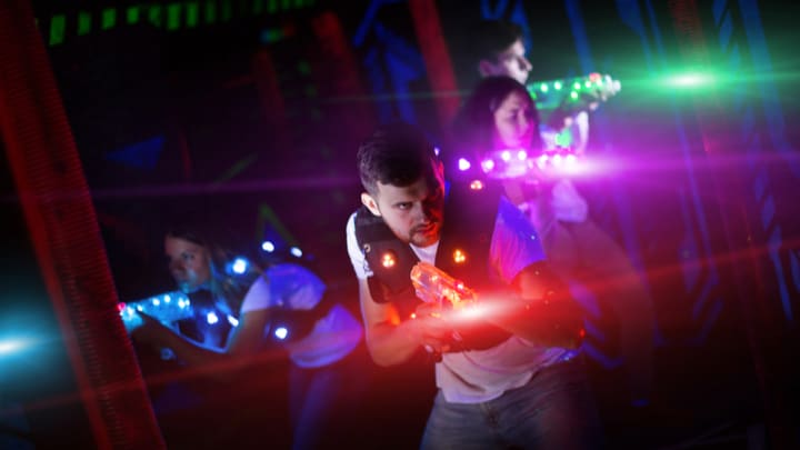 Image of Light, Urban, Adult, Male, Man, Person, Lighting, Club, Female, Woman, Concert, Crowd,