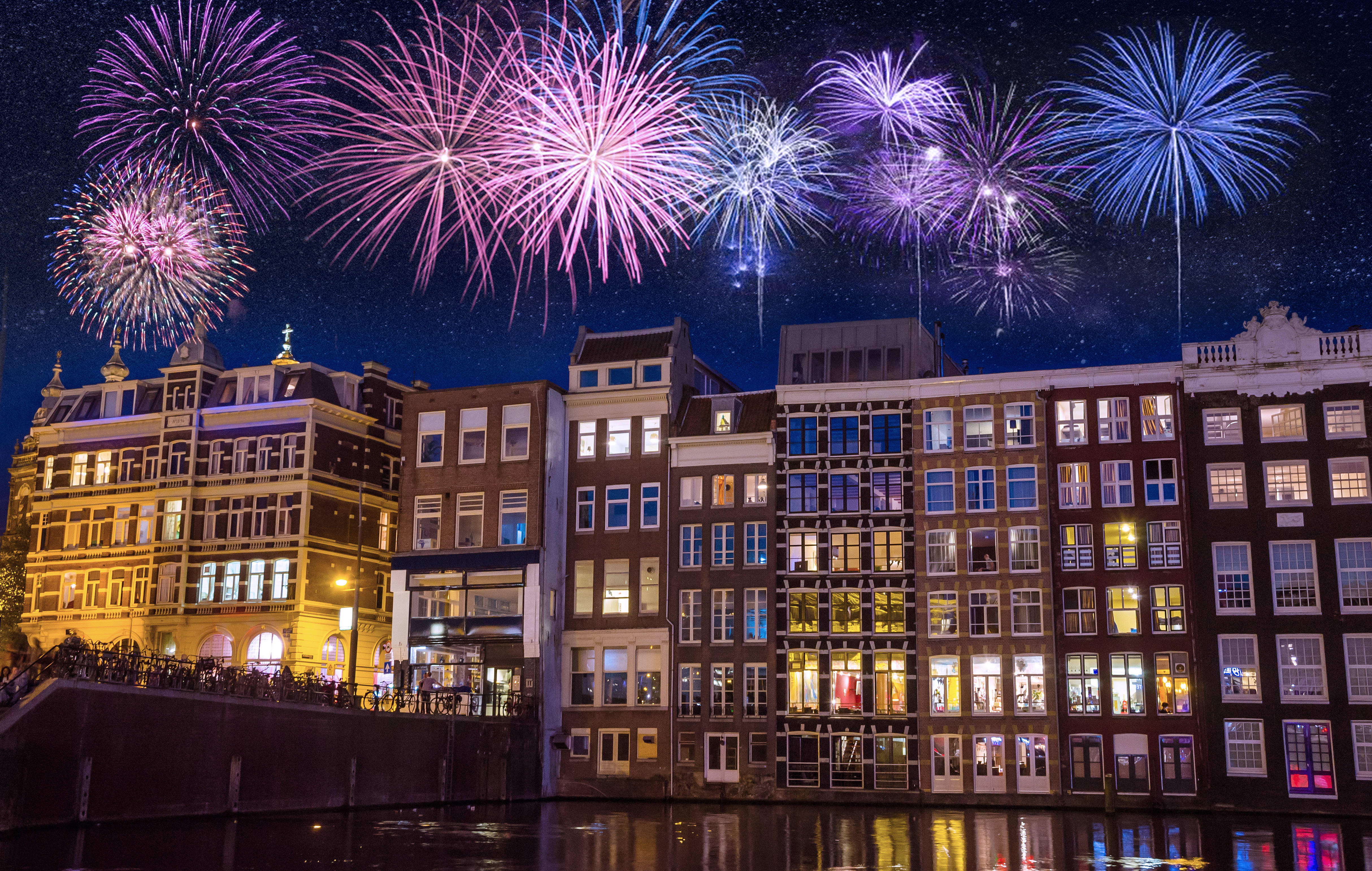 Image of City, Fireworks, Metropolis, Urban, Lighting, Neighborhood, Person, Nature, Night, Outdoors, Condo, Housing,