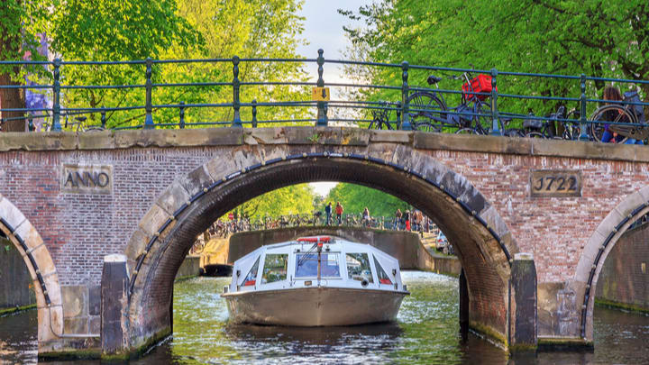 Image of Canal, Outdoors, Water, Boat, Vehicle, Watercraft, Arch, Bicycle, Path, Person, Boating, Water Sports, Waterfront, 