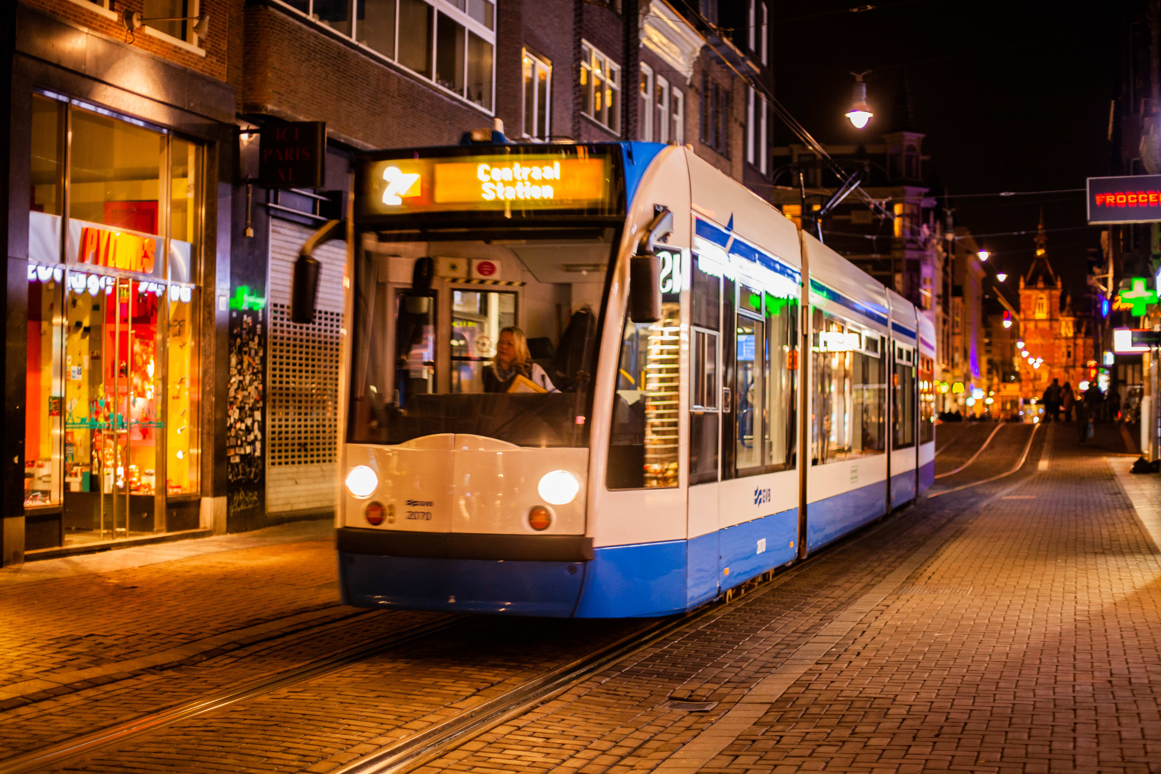 Image of Person, City, Metropolis, Urban, Cable Car, Vehicle,