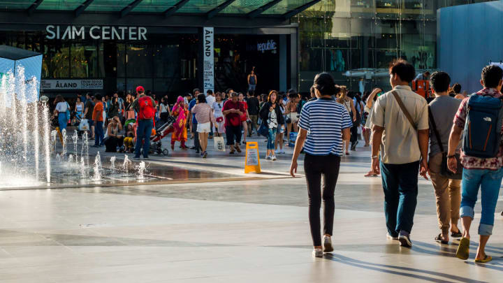 Image of Person, Walking, Adult, Male, Man, Female, Woman, Pants, Bag, Handbag, Pedestrian, Backpack, 