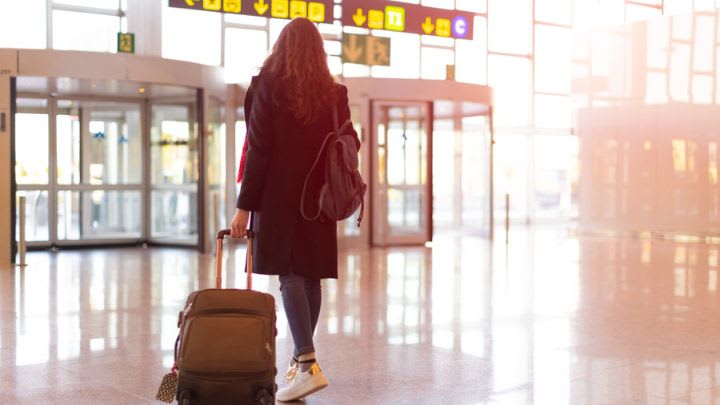 Image of Adult, Female, Person, Woman, Coat, Baggage, Airport, 