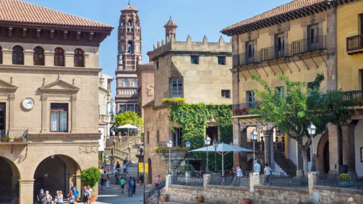 Image of City, Road, Street, Urban, Neighborhood, Bell Tower, Tower, Downtown, Clock Tower, Arch, Person,