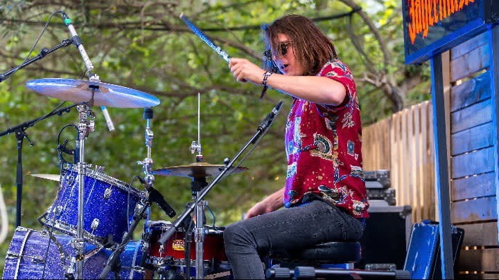 Image of Drummer, Music, Musical Instrument, Musician, Percussion, Performer, Person, Adult, Female, Woman, Solo Performance, 