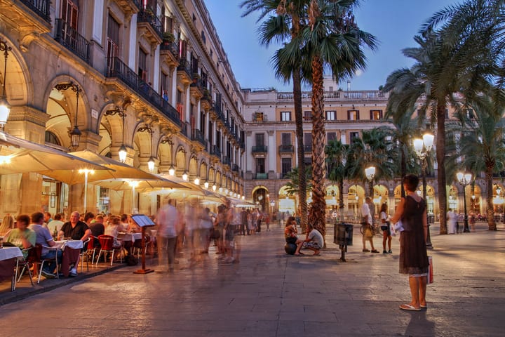 Image of City, Indoors, Restaurant, Path, Urban, Person, Cafeteria, Road, Street, Palm Tree, Tree, Chair, Furniture, Sidewalk, Handbag, 