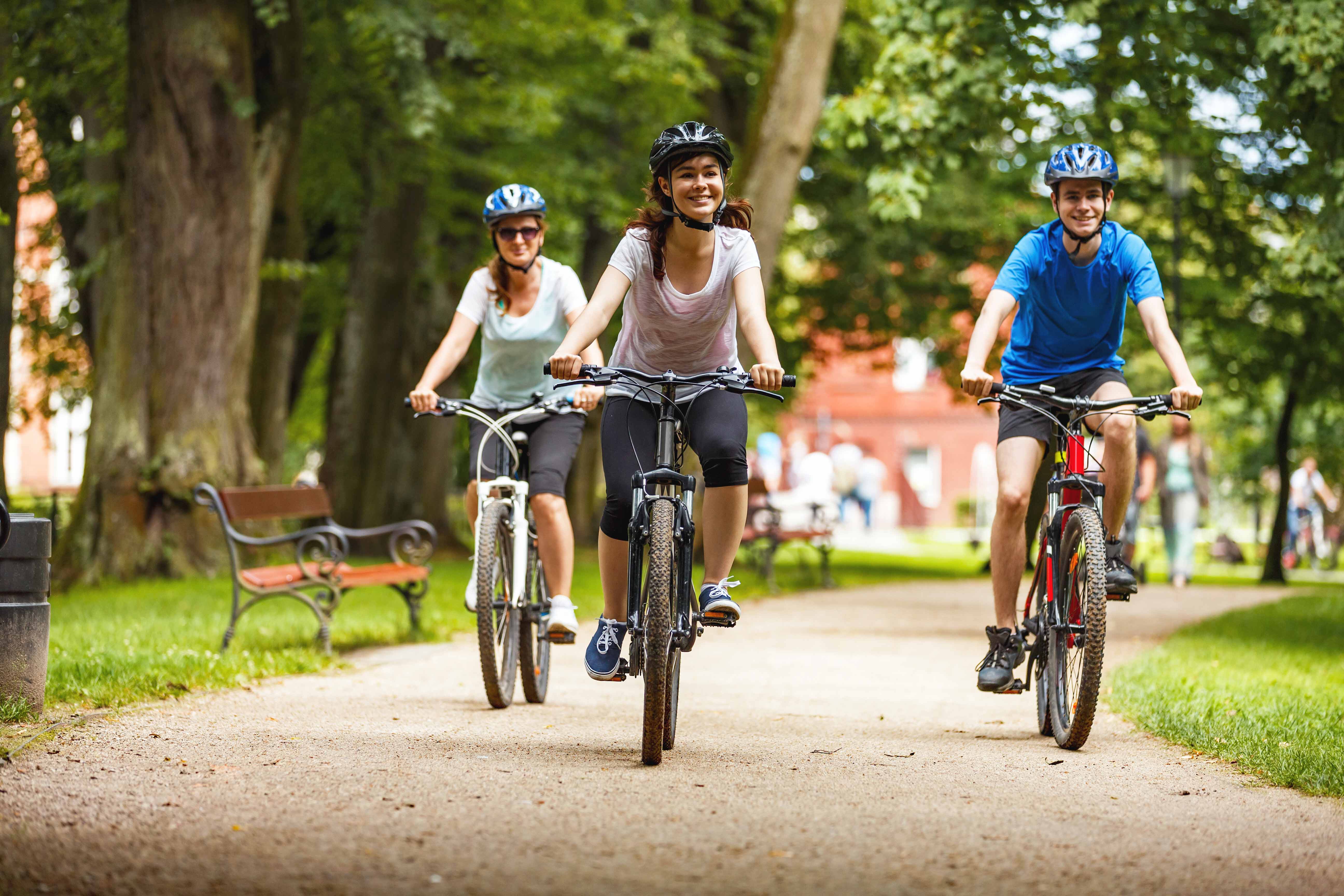 Image of Helmet, Bicycle, Cycling, Person, Vehicle, Boy, Male, Teen, Adult, Female, Woman, Bench, 