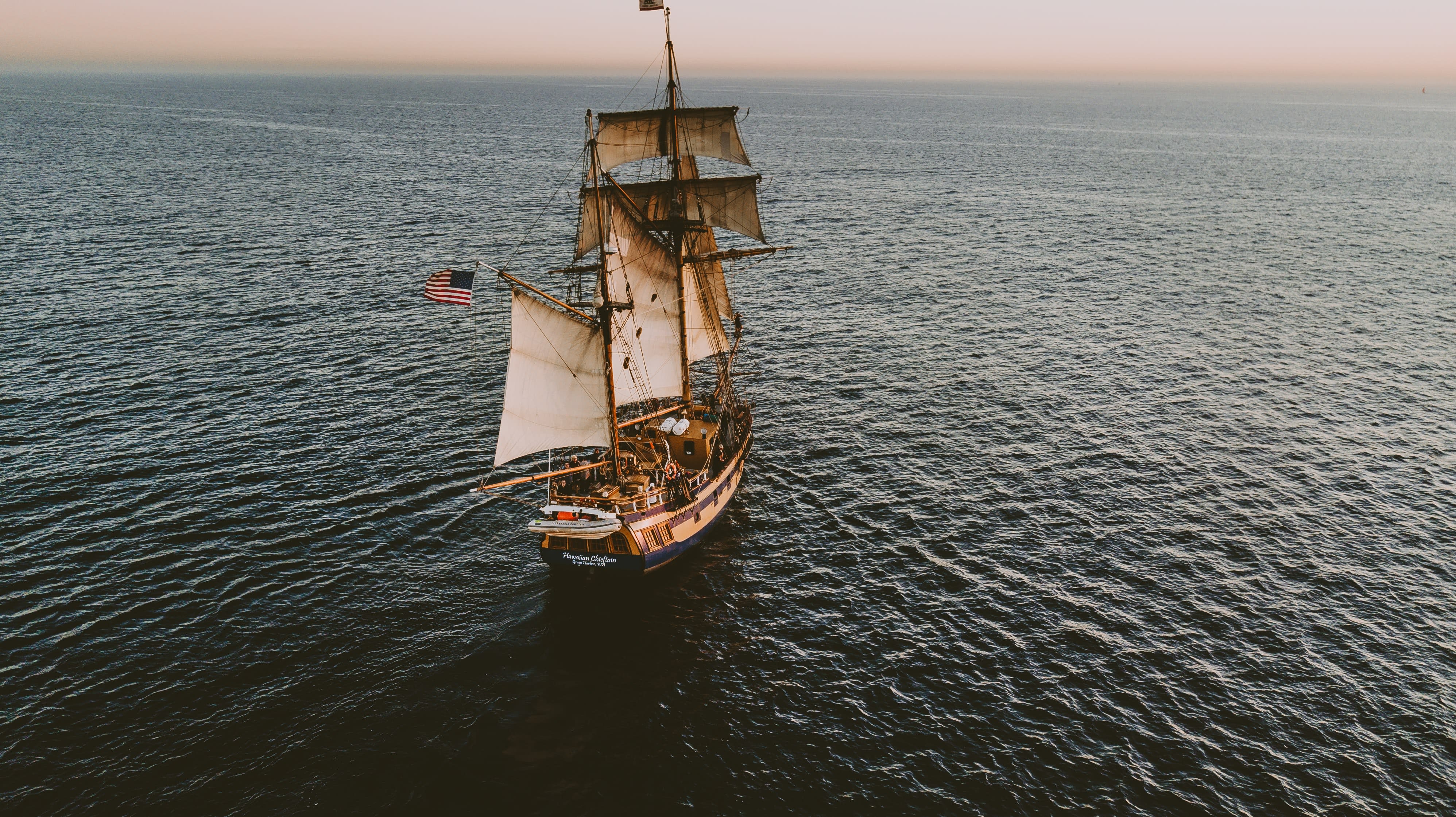 Image of Boat, Sailboat, Vehicle, Flag, Horizon, Nature, Outdoors, Sky, Watercraft, 