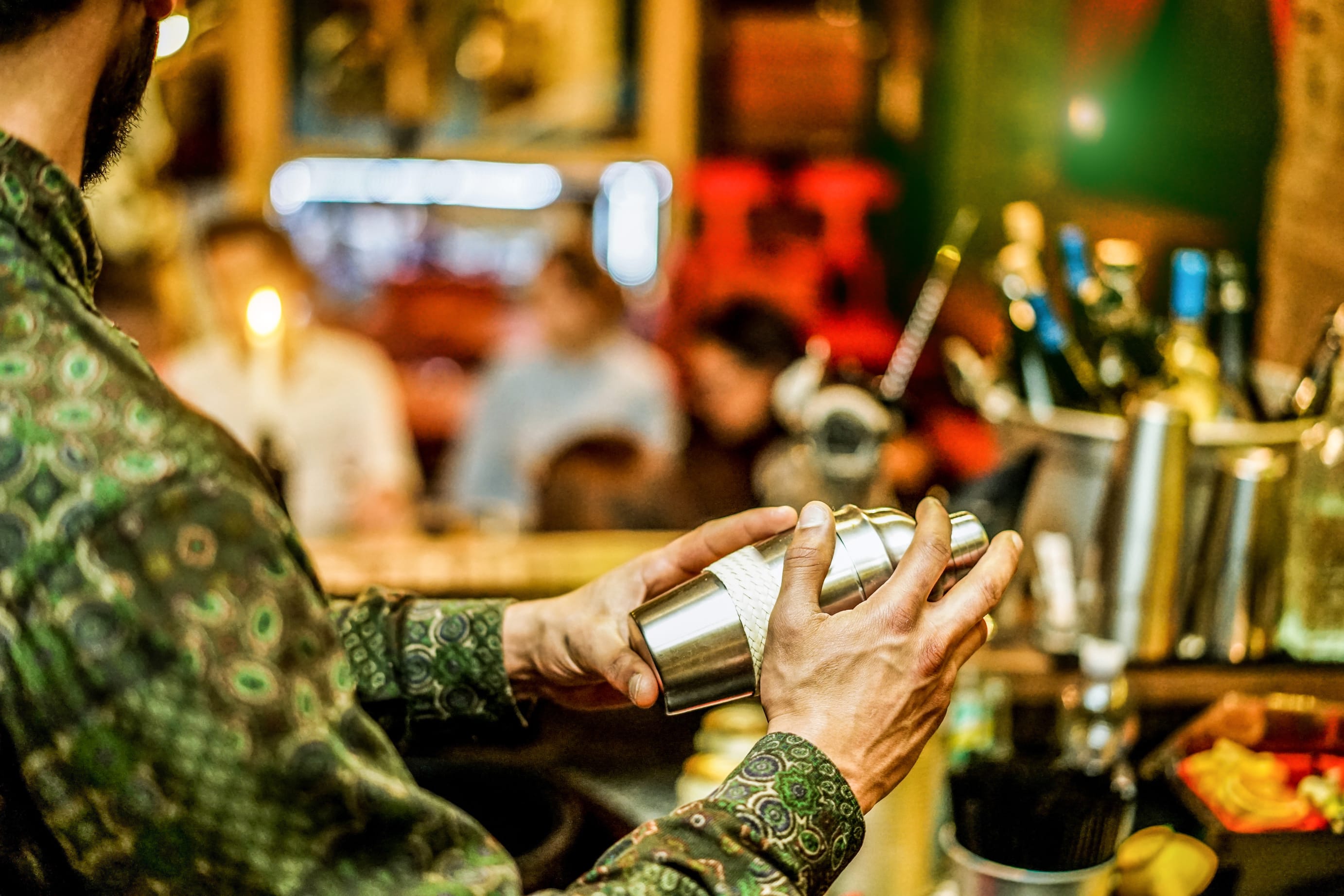 Image of Alcohol, Bartender, Beverage, Person, Bottle, Shaker, Adult, Male, Man, Finger, Hand, Child, Female, Girl, 