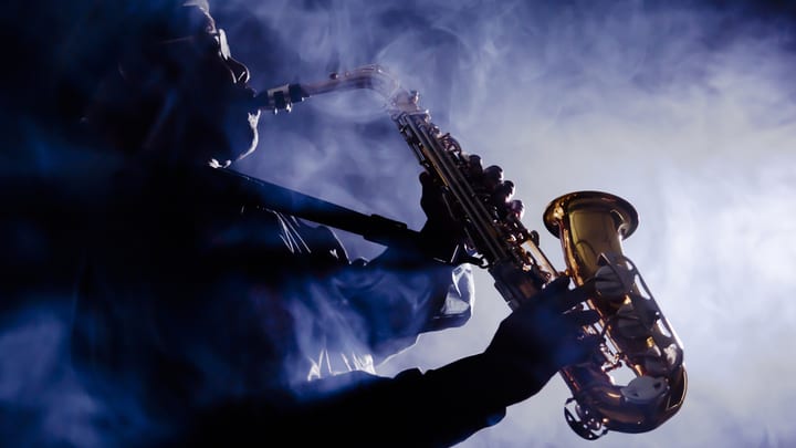 Image of Concert, Crowd, Person, Adult, Male, Man, Musical Instrument, Saxophone, 