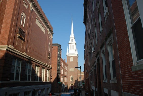 Image of City, Road, Street, Urban, Spire, Tower, Bell Tower, Neighborhood, Clock Tower, Person, Brick, Alley, Condo, Housing, Car, 