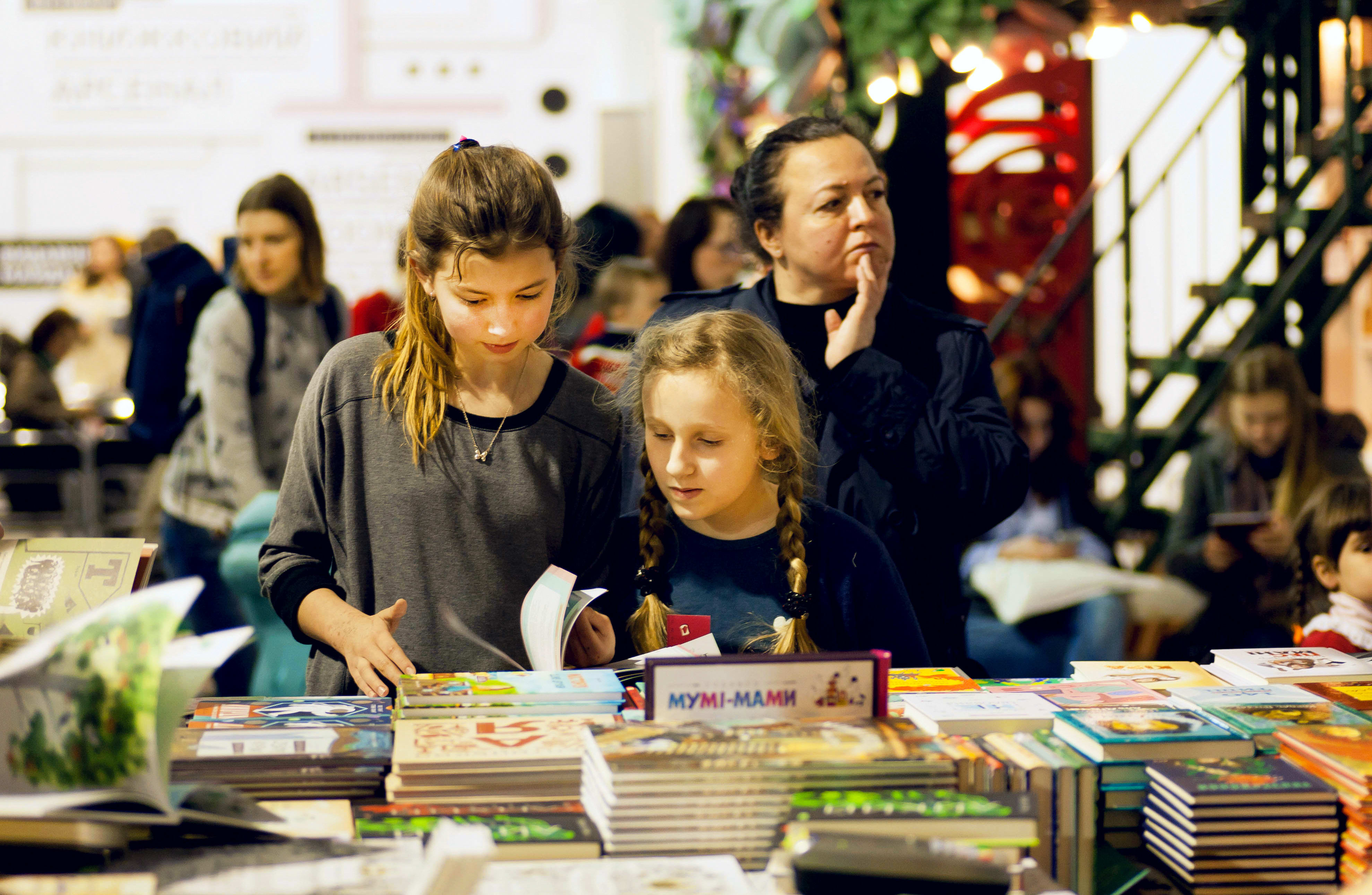 Image of Book, Publication, Child, Female, Girl, Person, Adult, Woman, Indoors, Library, People, 