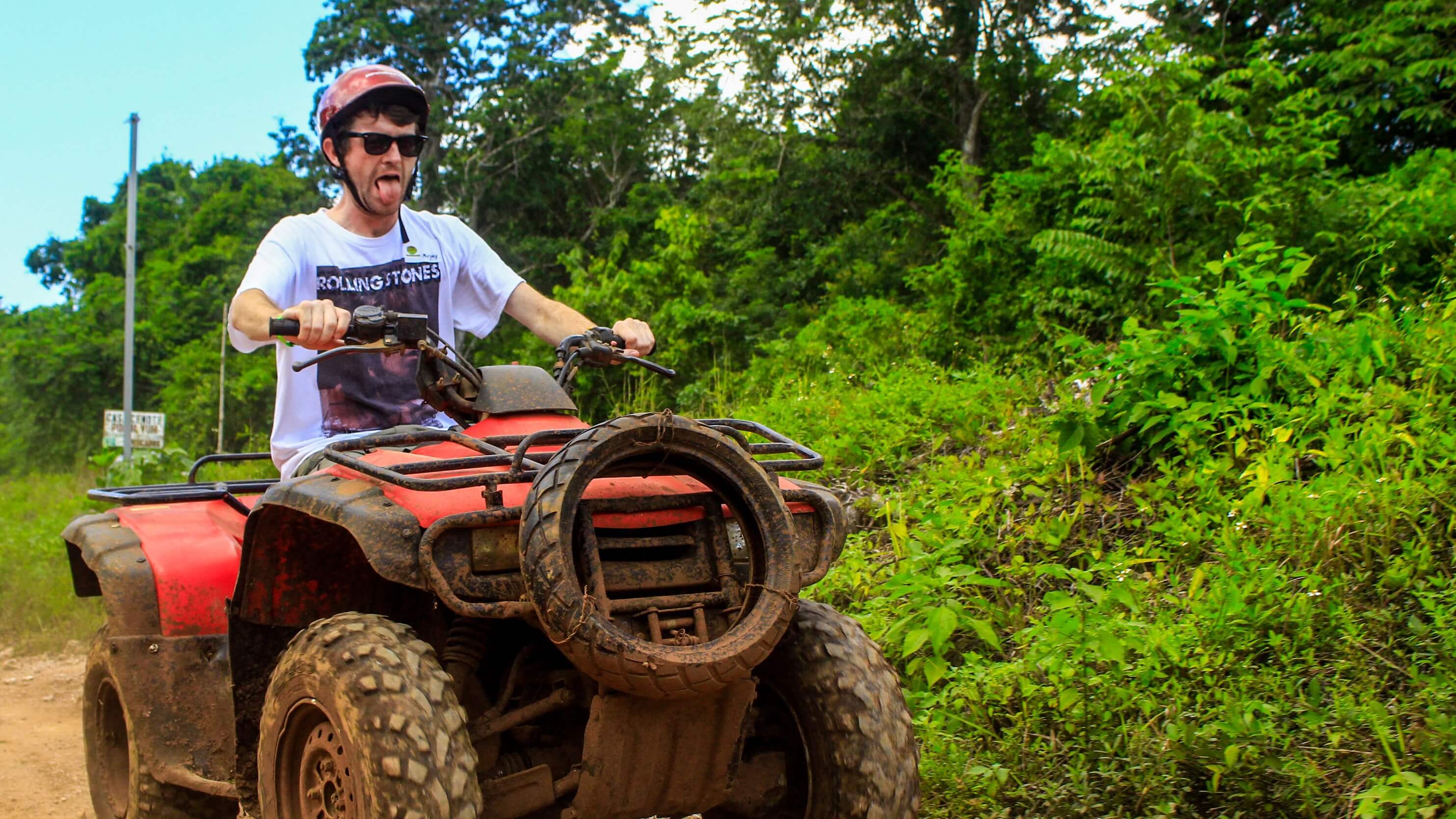 Image of Helmet, Atv, Vehicle, Adult, Male, Man, Person, Glasses, Vegetation, 