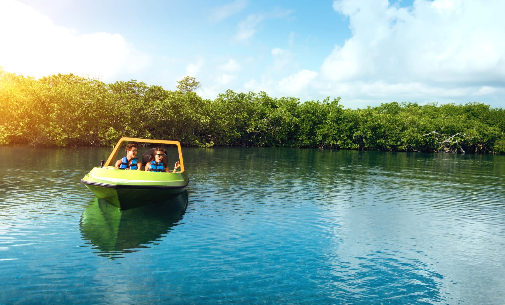 Image of Summer, Vegetation, Land, Nature, Outdoors, Rainforest, Tree, Boat, Vehicle, Scenery, Person, Water, Lake, Woodland, Landscape, Jungle, Boating, Water Sports, Sea, 