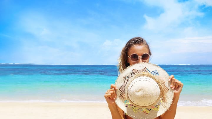 Image of Beachwear, Sunglasses, Hat, Adult, Female, Person, Woman, Beach, Coast, Nature, Outdoors, Sea, Shoreline, Water, 