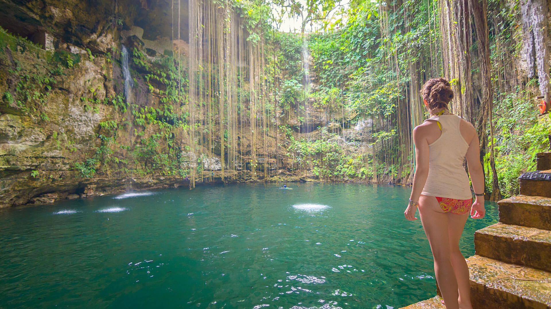 Image of Land, Nature, Outdoors, Rainforest, Tree, Vegetation, Swimwear, Summer, Jungle, Rock, Adult, Female, Person, Woman, Shorts, Scenery, Photography, 