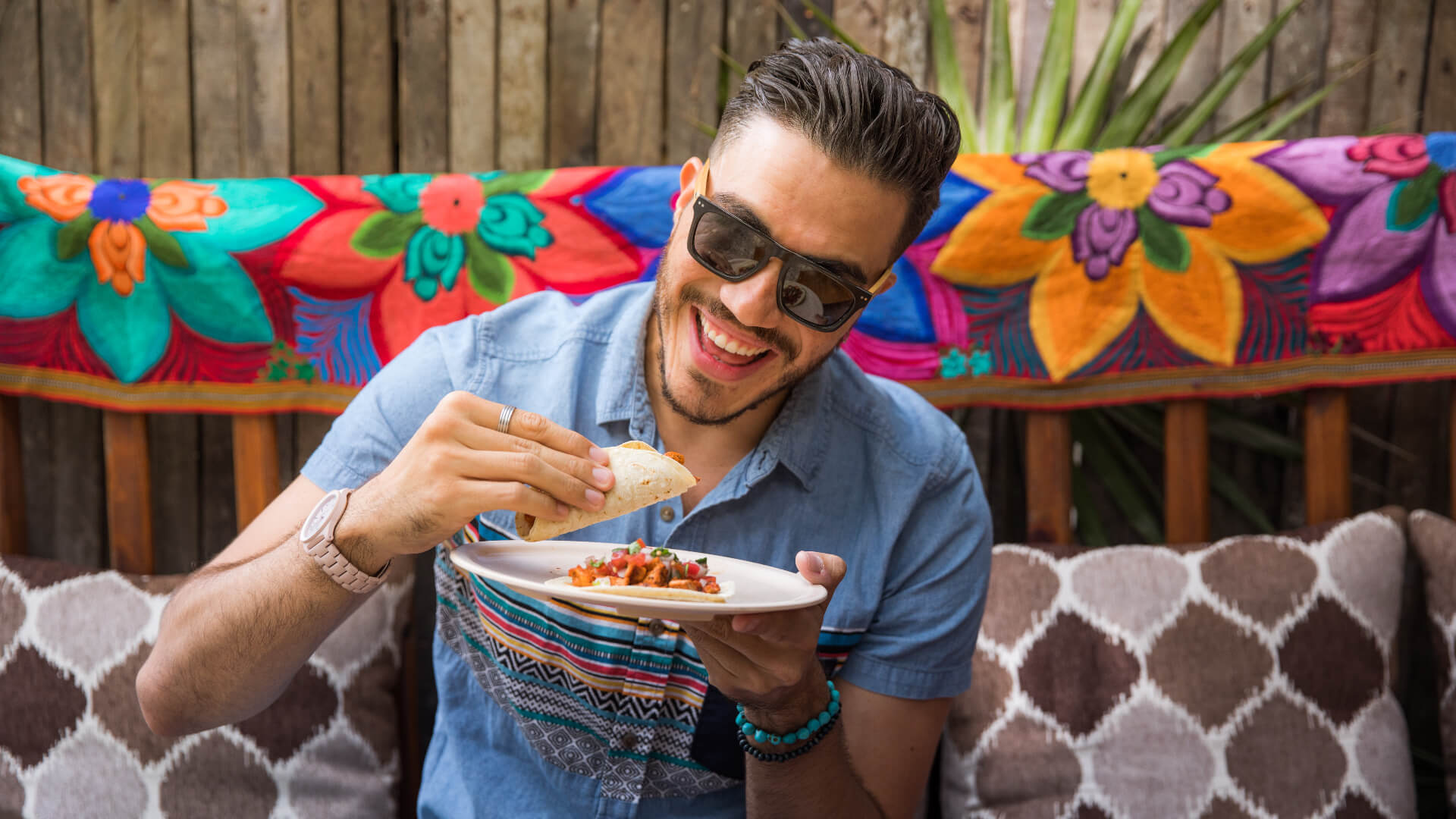 Image of Adult, Male, Man, Person, Eating, Food, Sunglasses, 