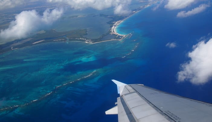 Image of Land, Nature, Outdoors, Sea, Water, Shoreline, Coast, Aircraft, Airplane, Vehicle, Island, 