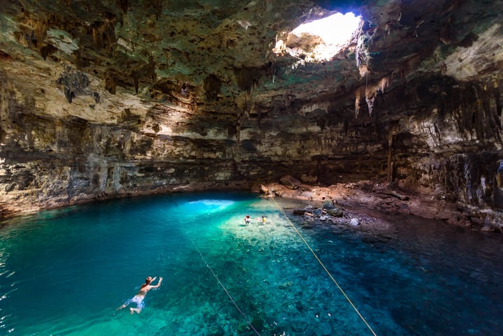 Image of Outdoors, Nature, Cave, Person, Water, Lagoon, Lake, Sea,