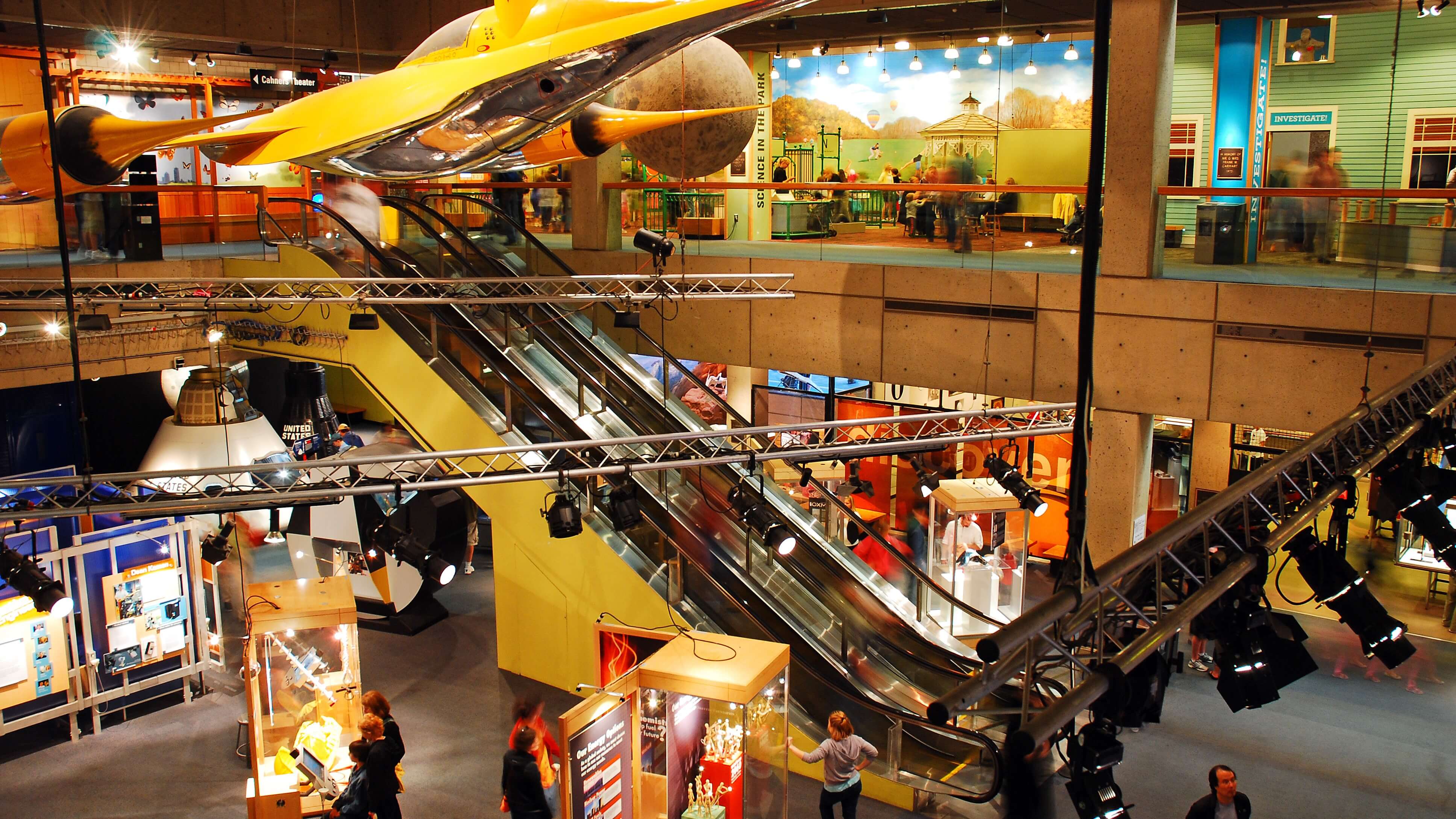 Image of Shop, Shopping Mall, Person, House, Housing, Staircase, Handrail, Lighting, Adult, Female, Woman, People, 