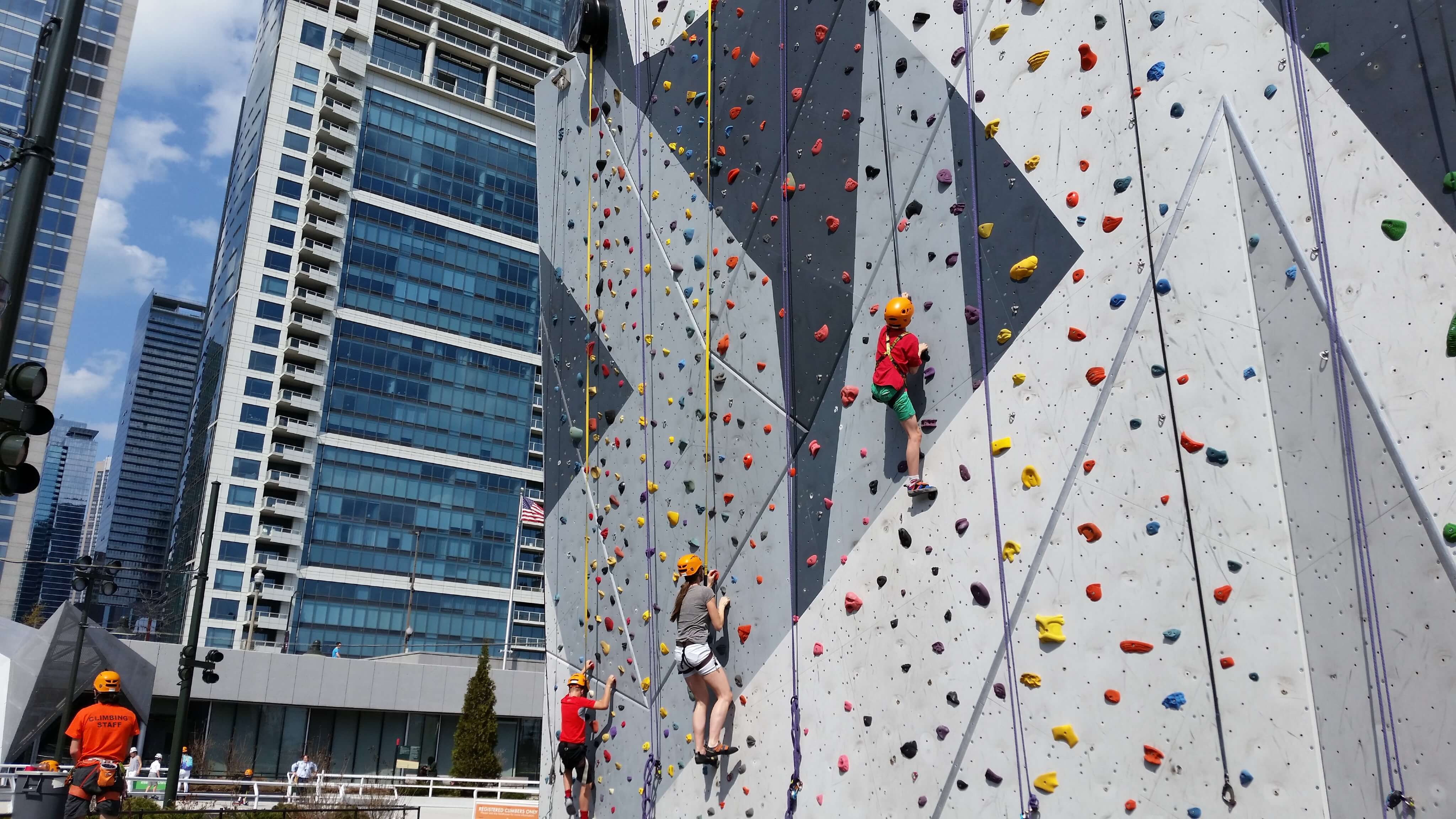 Image of Outdoors, Helmet, Person, Climbing, Handbag, Traffic Light, Adventure, Rock Climbing,