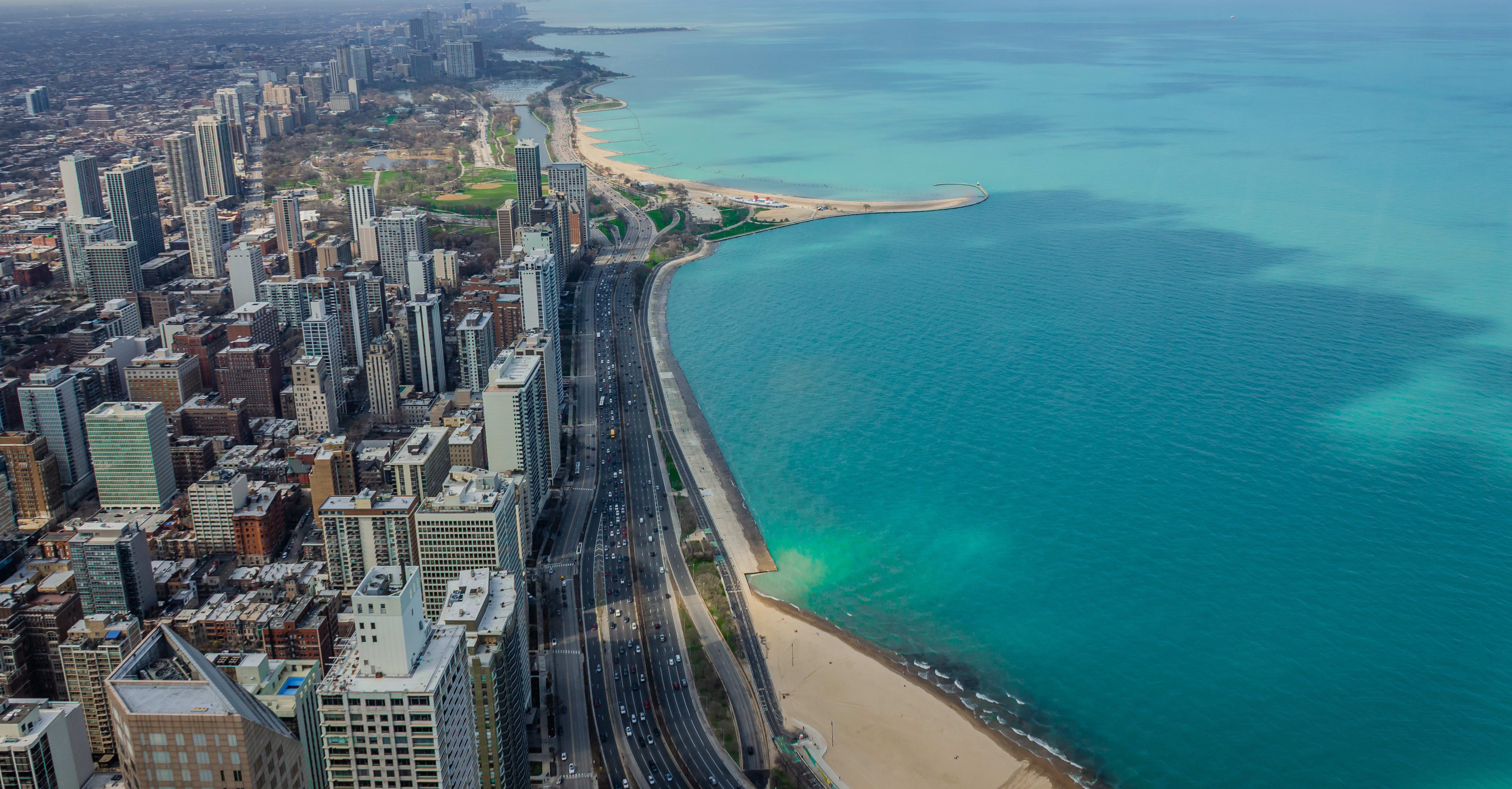 Image of Building, Cityscape, Urban, Outdoors, City, Nature, Sea, Water, Road, Aerial View, Shoreline, Coast, 