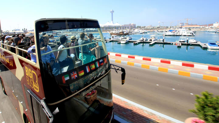 Image of Water, Waterfront, Person, Boat, Vehicle, Harbor, Pier, Bus,
