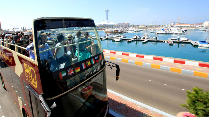 Image of Water, Waterfront, Person, Boat, Vehicle, Harbor, Pier, Bus, 