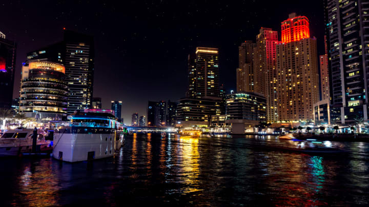 Image of City, Metropolis, Urban, Water, Waterfront, Cityscape, Office Building, High Rise, Nature, Night, Outdoors, Boat, Vehicle, Downtown, Harbor, Pier, Watercraft, 