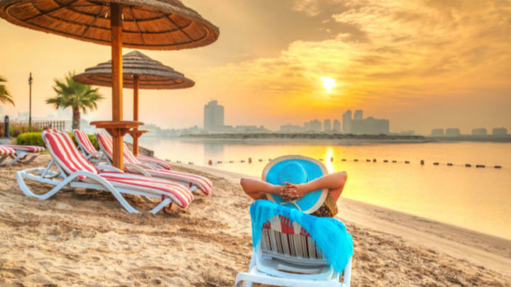 Image of Summer, Beach, Coast, Nature, Outdoors, Sea, Shoreline, Water, Shelter, Sky, Tree, Chair, Furniture, Palm Tree, Child, Female, Girl, Person, 