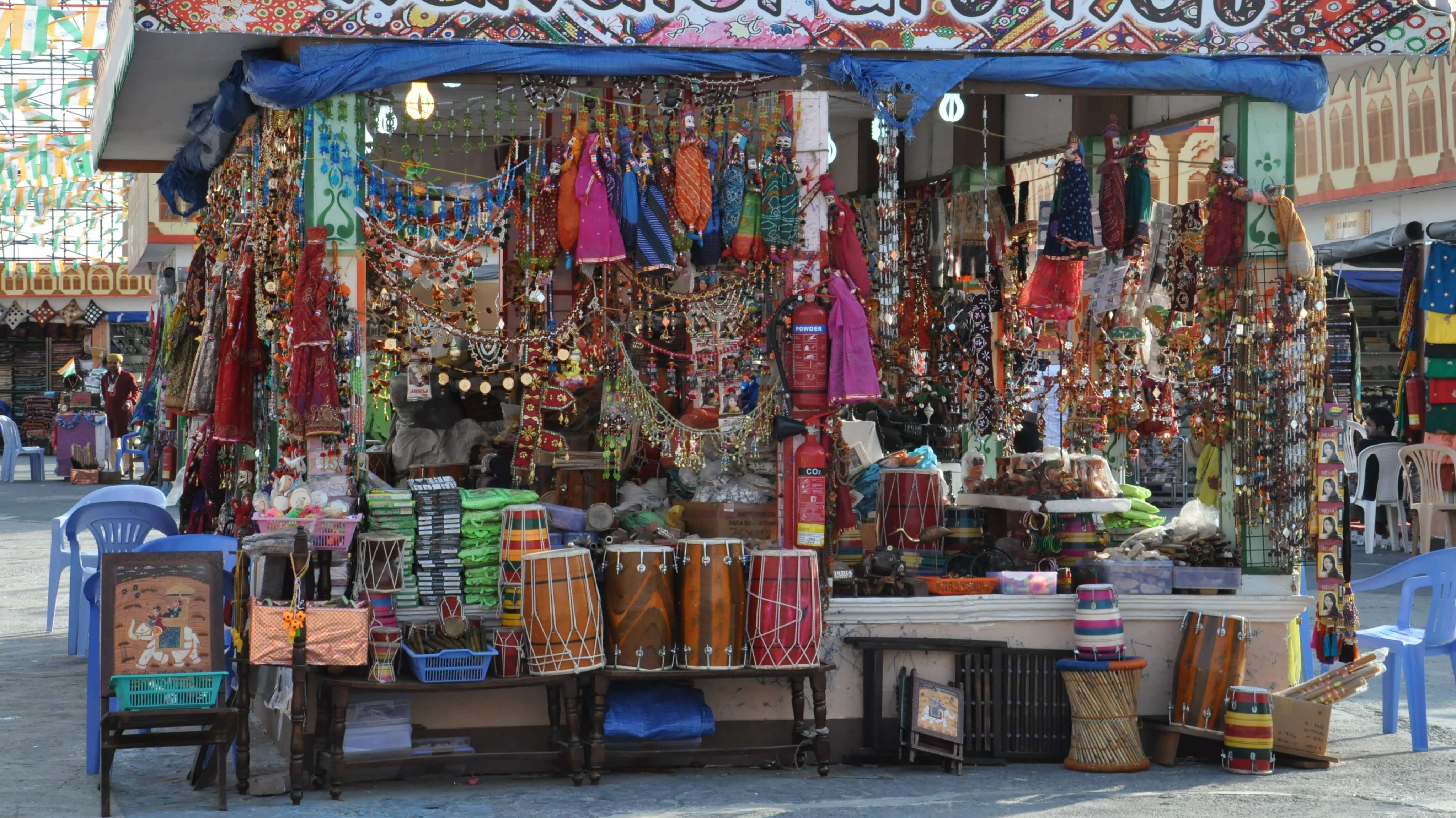 Image of Bazaar, Market, Shop, Art, Handicraft, Chair, Person, Accessories, Bag, Handbag, 